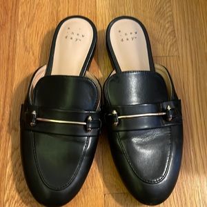 A New Day Black with Silver lining design Loafers! Size 6. Great Condition!
